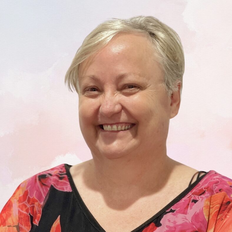 Photo of Tina, a smiling therapist at TMCS.